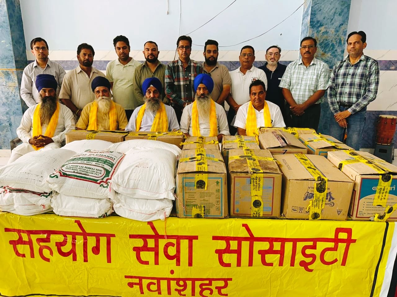 Sahayog Sewa Society distributed ration to 11 needy families.